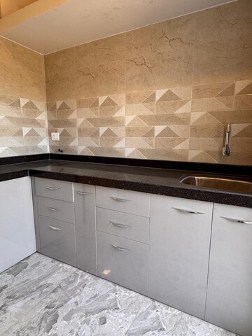 Kitchen in 1 BHK Apartment at Atharv Swanand Vedika, Badlapur West – for Sale