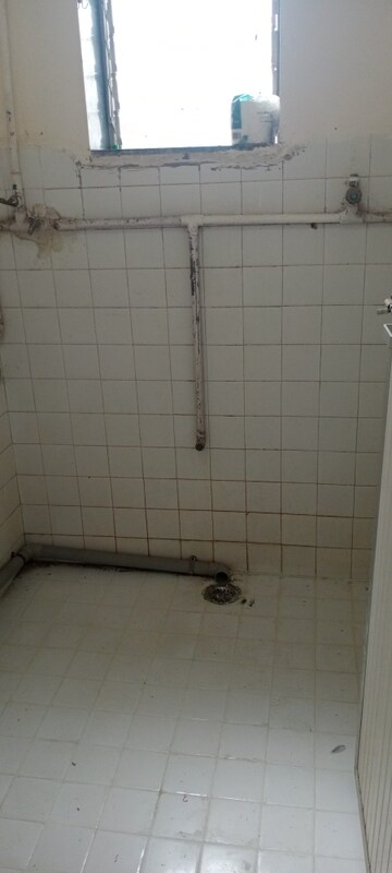 Bathroom in 1 BHK Apartment at Takshila CHS, Andheri East – for Sale