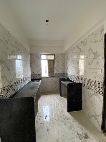 Kitchen in 1 BHK Apartment at DGS Sheetal Tapovan, Malad East – for Sale