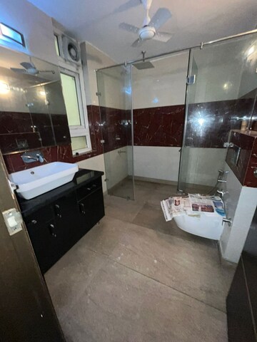 Bathroom in 4 BHK Builder Floor at Gulmohar Park – for Rent