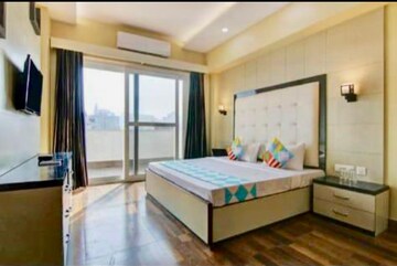Bedroom in 4 BHK Builder Floor at Ansal Sushant Lok I, Sector 43 – for Rent