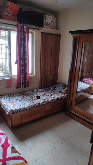 Bedroom in 2 BHK Apartment at Shree Hans Nagar CHS, Dhanori – for Sale