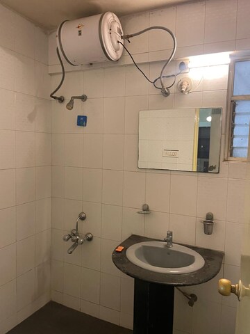 Bathroom in 2 BHK Apartment at Siddharth Ganga Tower, Kalyani Nagar – for Rent
