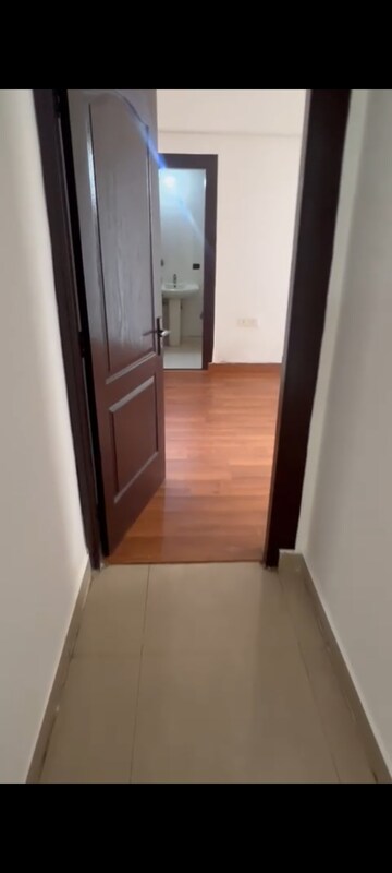Building Lobby in 2.5 BHK Apartment at Amrapali Empire, Sain Vihar – for Sale