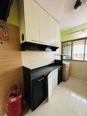 Kitchen in 2 BHK Apartment at Aarti Nagari, Kalyan West – for Sale