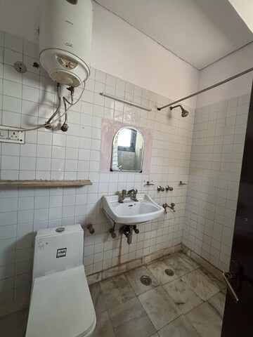 Bathroom in 2 BHK Apartment at Gaur City-2, Gaur City 2 – for Rent