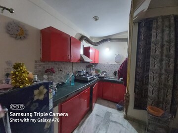 Kitchen in 2 BHK Apartment at Gaur City 2 - 10th Avenue, Sector 16c Greater Noida – for Rent