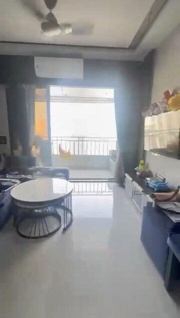 Living Room in 2 BHK Apartment at Lotus Unity, Versova – for Rent