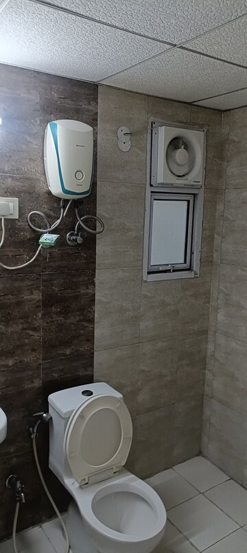 Bathroom in 2 BHK Apartment at Panchsheel Pebbles, Vaishali Sector 3 – for Rent