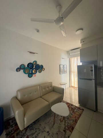 Living Room in 1 BHK Apartment at L&T Raintree Boulevard, Hebbal – for Rent