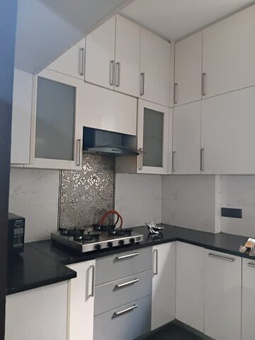 Kitchen in 3.5 BHK Apartment at Smart World Orchard, Sector 61 – for Rent