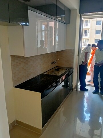 Kitchen in 3 BHK Apartment at Ansal Highland Park, Sector 103 – for Rent