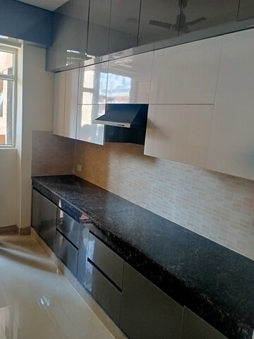 Kitchen in 3 BHK Apartment at Ansal Highland Park, Sector 103 – for Rent