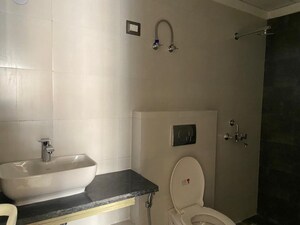 Bathroom in 2 BHK Apartment at Windlass River Valley, Harrawala – for Sale