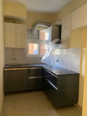 Kitchen in 2 BHK Apartment at Windlass River Valley, Harrawala – for Sale