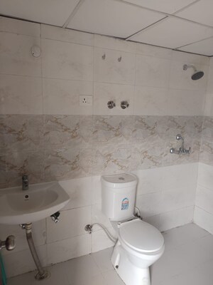 Bathroom in 2 BHK Apartment at Charms Castle, Raj Nagar Extension – for Sale