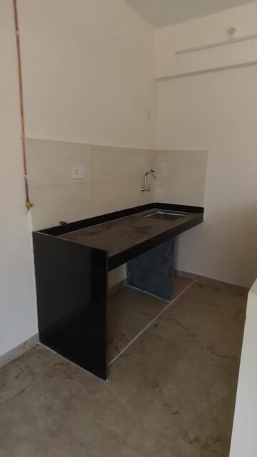 Kitchen in 2 BHK Apartment at Raunak Unnathi Greens, Kasarvadavali – for Rent