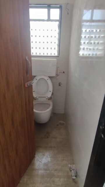 Bathroom in 2 BHK Apartment at Raunak Unnathi Greens, Kasarvadavali – for Rent