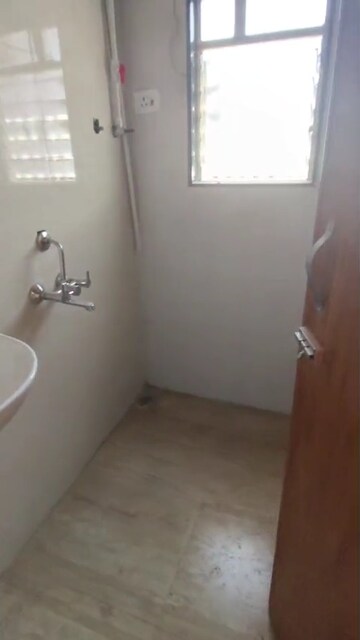 Bathroom in 2 BHK Apartment at Raunak Unnathi Greens, Kasarvadavali – for Rent