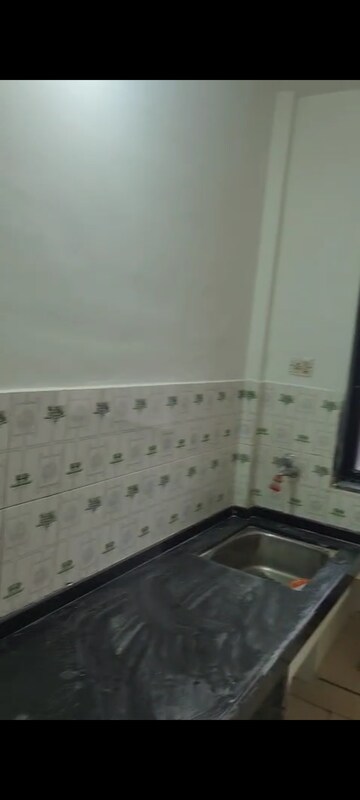 Bathroom in 1 BHK Apartment at Bhanushanti Complex, Malad East – for Rent