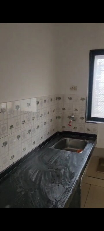 Kitchen in 1 BHK Apartment at Bhanushanti Complex, Malad East – for Rent
