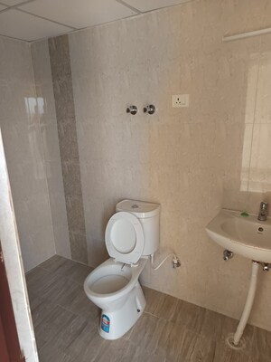 Bathroom in 2 BHK Apartment at Charms Castle, Raj Nagar Extension – for Sale