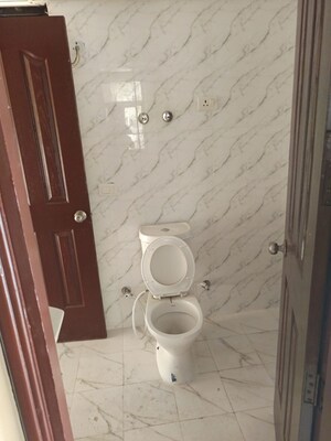 Bathroom in 2 BHK Apartment at Charms Castle, Raj Nagar Extension – for Sale