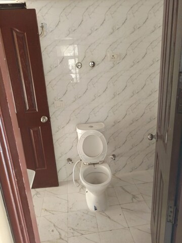 Bathroom in 2 BHK Apartment at Charms Castle, Raj Nagar Extension – for Sale