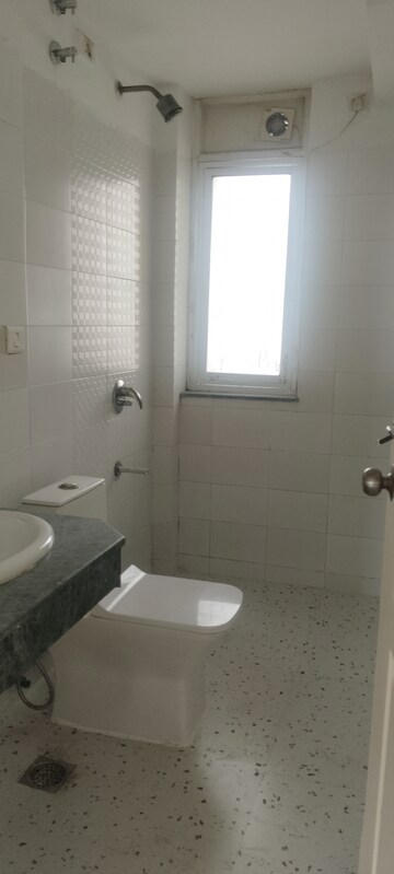 Bathroom in 3 BHK Apartment at Puri Pranayam, Sector 82 – for Rent
