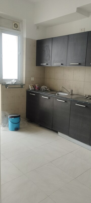 Kitchen in 3 BHK Apartment at Puri Pranayam, Sector 82 – for Rent