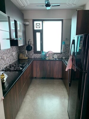 Kitchen in 3 BHK Builder Floor at Sector 15 – for Sale