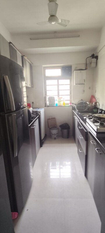 Kitchen in 1 BHK Apartment at Sheth Vasant Oasis, Andheri East – for Rent