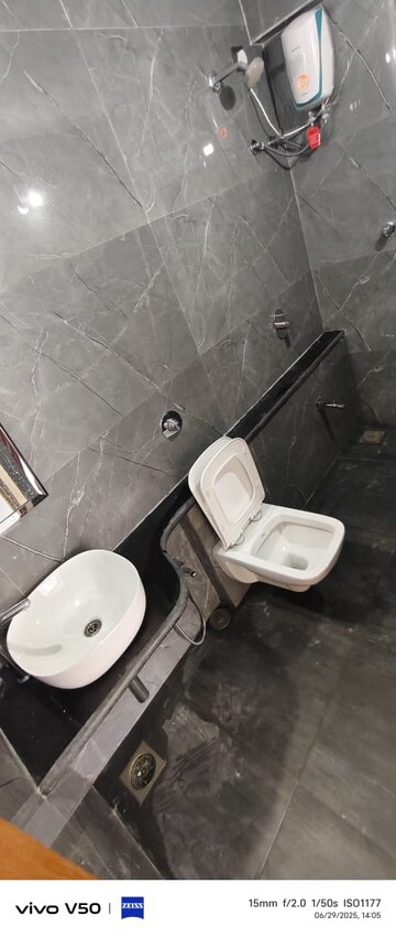 Bathroom in 2 BHK Apartment at Veena Solace, Santacruz West – for Sale