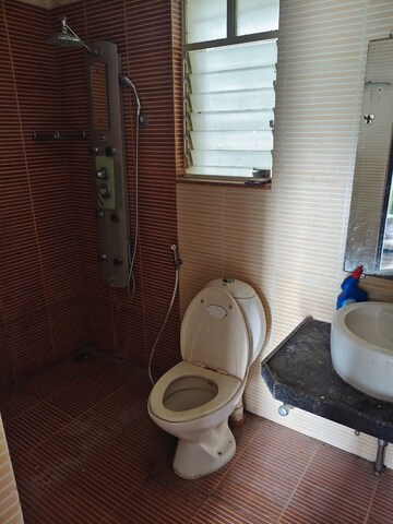 Bathroom in 2 BHK Apartment at Megapolis Sangria Towers, Hinjewadi – for Rent