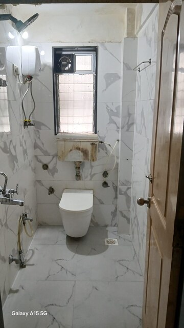 Bathroom in 1 BHK Apartment at Galaxy Heights, Goregaon West – for Rent