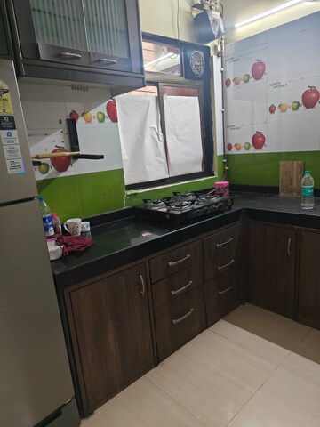 Kitchen in 2 BHK Apartment at Oracle Sapphire CHS, Nerul – for Rent