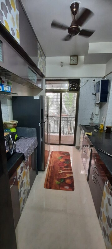 Kitchen in 1 BHK Apartment at K M Horizon Palms 2, Owale – for Rent