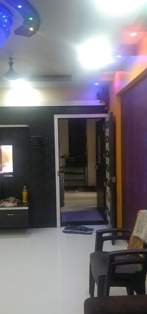 Living Room in 2.5 BHK Apartment at Kopar Khairane Sector 14 – for Sale