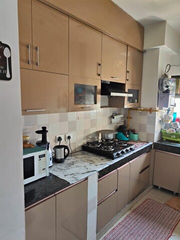 Kitchen in 2 BHK Apartment at Nimbus The Park Street, Chi V Greater Noida – for Sale