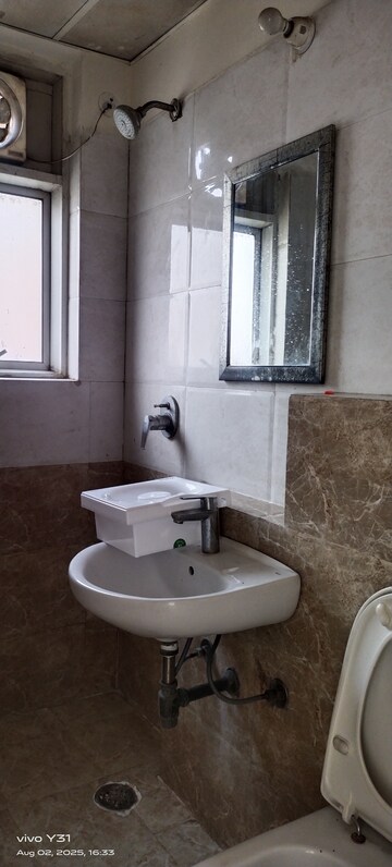 Bathroom in 3 BHK Apartment at Sam Palm Olympia, Sector 16c Greater Noida – for Rent