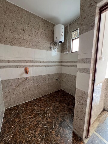 Bathroom in 2 BHK Builder Floor at Spazedge, Sector 47 – for Rent