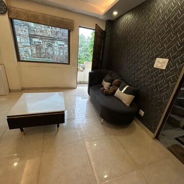 Living Room in 1 RK Builder Floor at South Extension I – for Rent