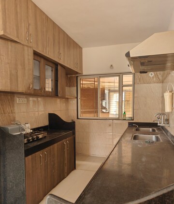Kitchen in 2 BHK Apartment at Mont Vert Pristine, Bopodi – for Sale