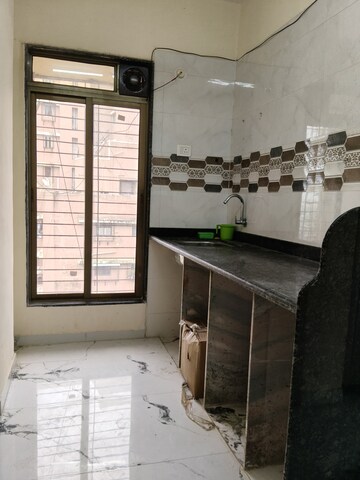 Kitchen in 1 BHK Apartment at Shiv Ganga CHS, Santacruz East – for Sale