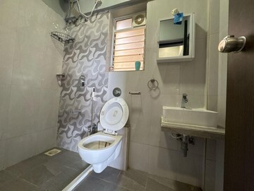 Bathroom in 3 BHK Apartment at Dn Nagar – for Rent