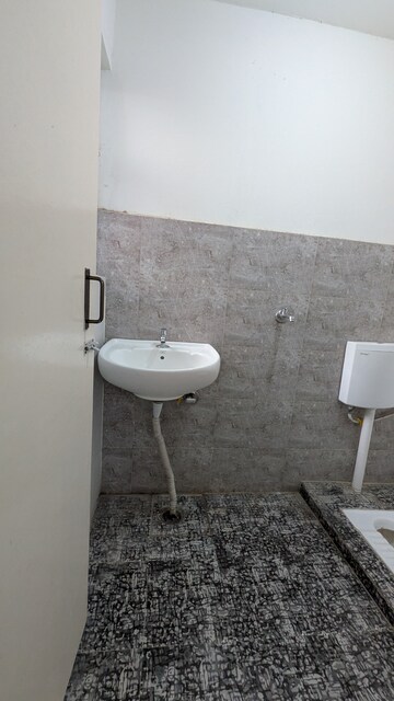 Bathroom in 1 BHK Apartment at Aditya Vrinda Homes Phase 2, Shahpur Bamheta – for Rent