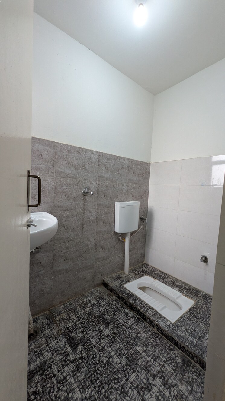 Bathroom, aditya-vrinda-homes-phase-2 1 Bedroom 338 Sq.Ft. Apartment In Shahpur Bamheta Ghaziabad 9026216