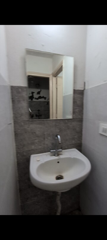 Bathroom in 1 BHK Apartment at Aditya Vrinda Homes Phase 2, Shahpur Bamheta – for Rent