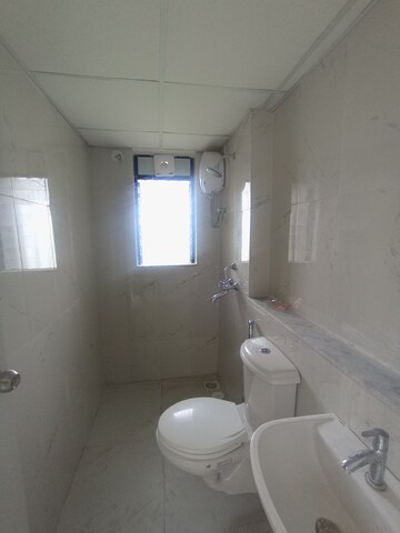 Bathroom in 1 BHK Apartment at Runwal Gardens Phase 2, Dombivli East – for Rent