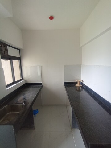 Kitchen in 1 BHK Apartment at Runwal Gardens Phase 2, Dombivli East – for Rent